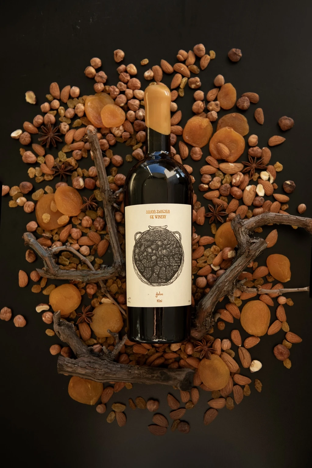 GK Winery bottle arranged in earthy autumn tones