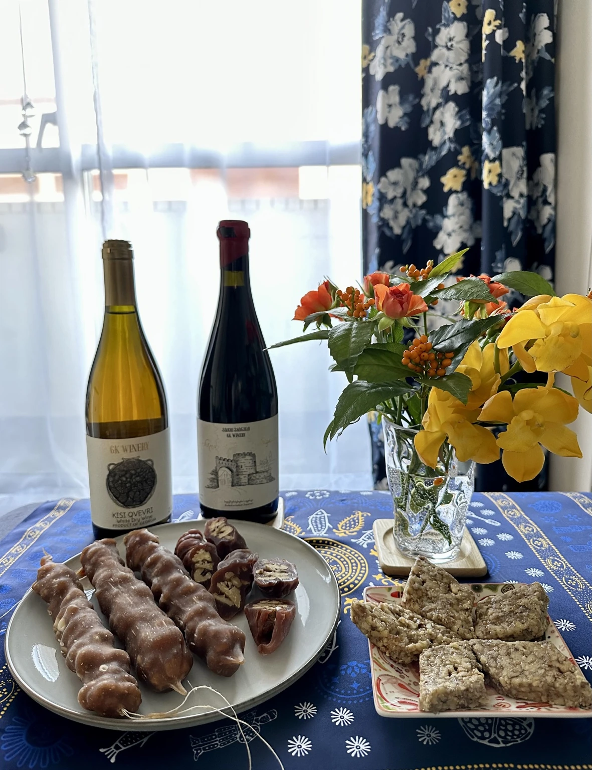 GK Winery bottles with Georgian sweets and flowers